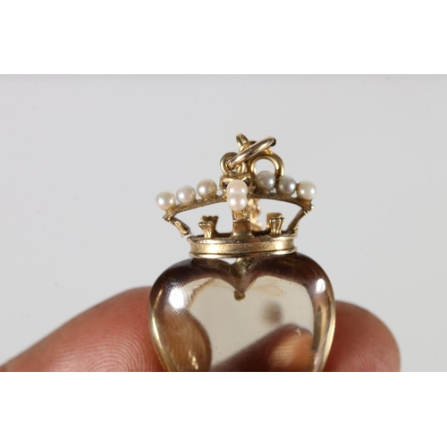 216 - Yellow metal mounted crowned heart pendant, the crown set with ten seed pearls, 5cm tall, also a 9ct... 