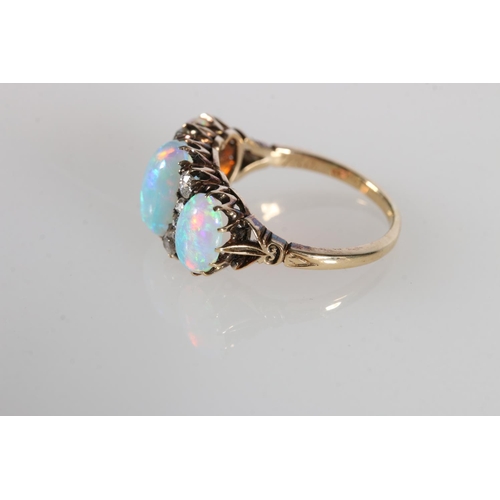 92 - 18ct gold opal and diamond eleven stone dress ring, ring size, O/P, 3.8g.