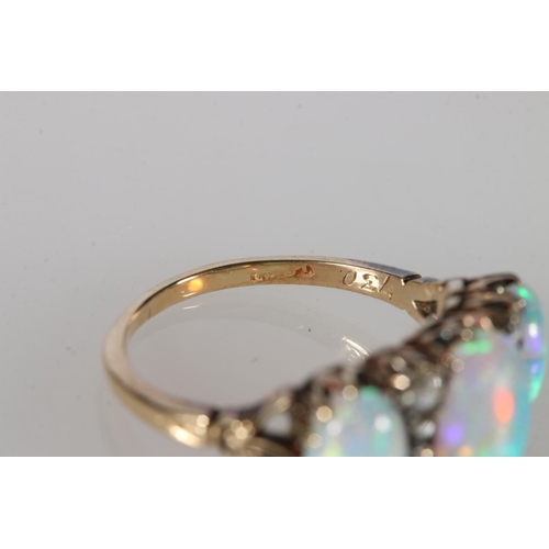 92 - 18ct gold opal and diamond eleven stone dress ring, ring size, O/P, 3.8g.