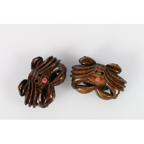 375A - Two carved wood netsukes in the form of crabs, both signed to underside, 6 x 4cm