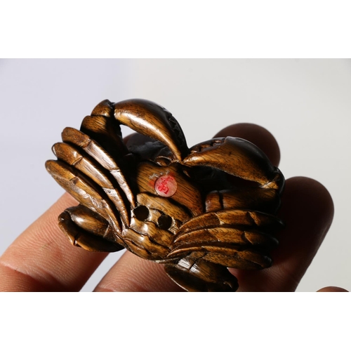 375A - Two carved wood netsukes in the form of crabs, both signed to underside, 6 x 4cm