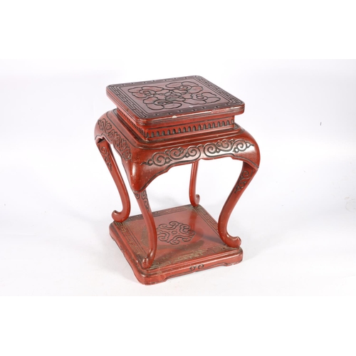 425A - Early 20th century Chinese red lacquer urn stand or occasional table, 40 x 26 x 26cm.