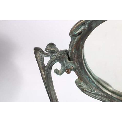 495A - Art Nouveau style Demoiselle a la Balancelle mirror frame after Erte, in silver-plated bronze stand ... 