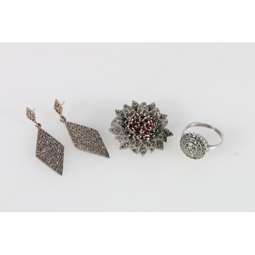 505A - Silver, garnet and marcasite brooch, marcasite diamond earrings, and a ring, size Q.