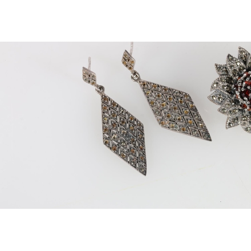 505A - Silver, garnet and marcasite brooch, marcasite diamond earrings, and a ring, size Q.