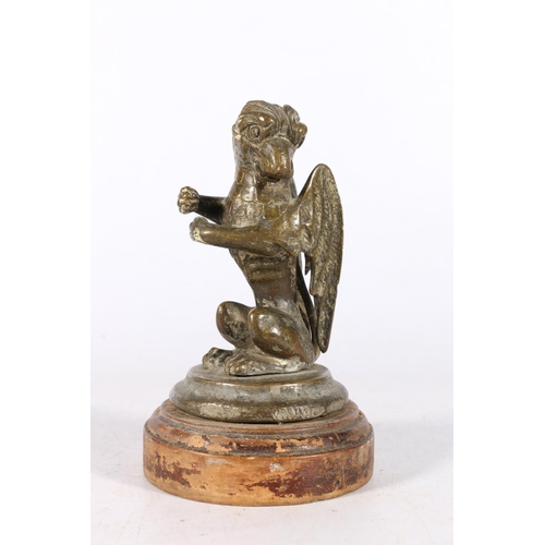 530A - Early 20th century bronze classic car mascot, cast and patinated as a winged griffin, 14cm.