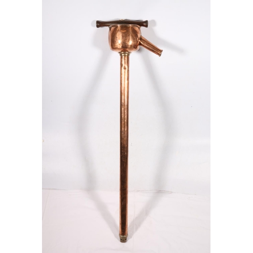 590A - Copper and brass mounted rum pump, 110cm.