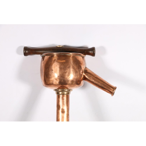 590A - Copper and brass mounted rum pump, 110cm.