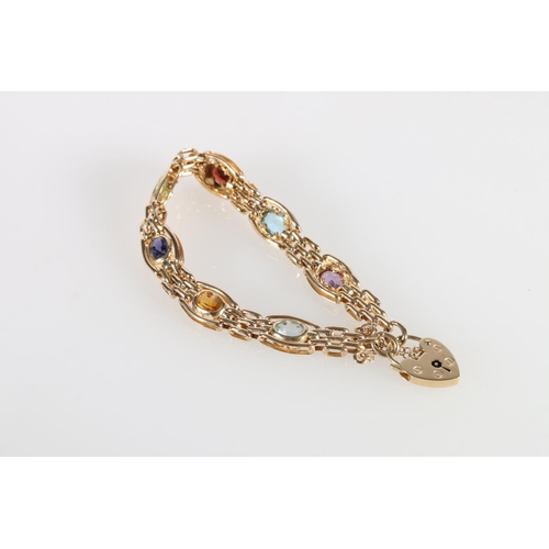 105 - 9ct gold bracelet set with eight faceted stones 18.3g gross, within James Walker of Edinburgh jewell... 