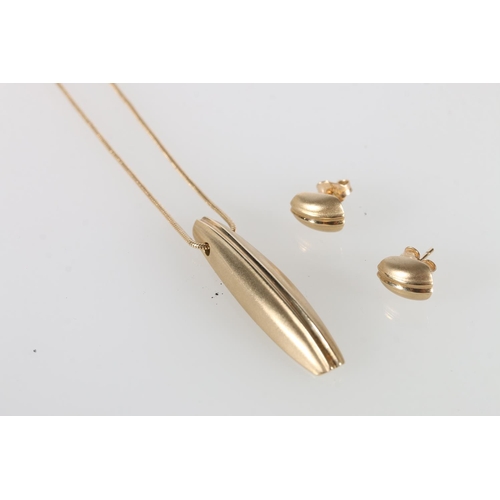 106 - Ola Marie Gorie (Scottish b1937), a 9ct gold pendant on chain and a pair of matching ear studs, 10.4... 