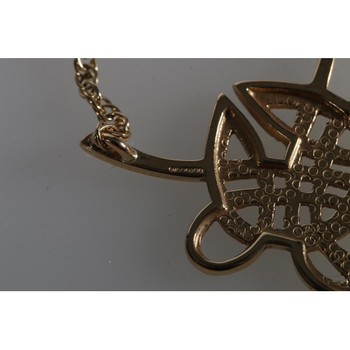 107 - Ola Marie Gorie (Scottish b1937), a 9ct gold 'Book of Kells' pendant on chain and a pair of similar ... 