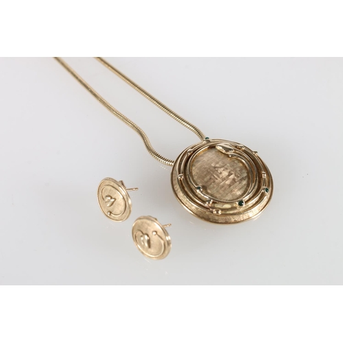 108 - Ola Marie Gorie (Scottish b1937), a 9ct gold Art Nouveau inspired pendant on chain and a pair of mat... 