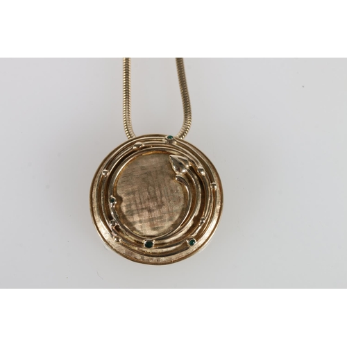 108 - Ola Marie Gorie (Scottish b1937), a 9ct gold Art Nouveau inspired pendant on chain and a pair of mat... 