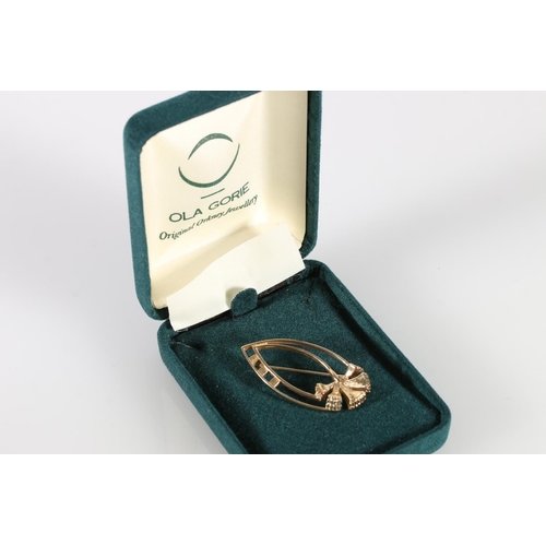 109 - Ola Marie Gorie (Scottish b1937), a 9ct gold floral brooch, 5.4g in Ola Gorie branded jewellery box.