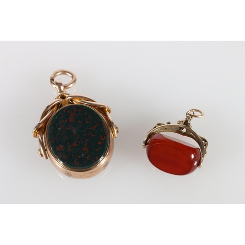 126 - 9ct gold mounted swivel fob set with bloodstone, 15.5g gross, and another unhallmarked 5.7g gross.  ... 