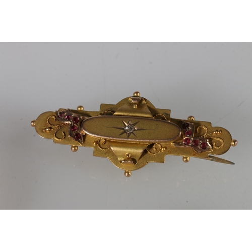 153 - Victorian 9ct gold ruby and diamond set mourning brooch, 3.7g gross, a 9ct gold bangle, 5.2g and an ... 