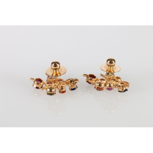 205 - Sri Lankan unhallmarked yellow metal gemstone set spray brooch 9.6g, and a pair of matching earrings... 