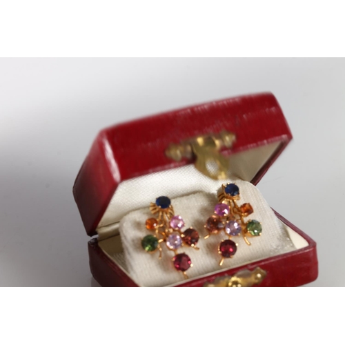 205 - Sri Lankan unhallmarked yellow metal gemstone set spray brooch 9.6g, and a pair of matching earrings... 