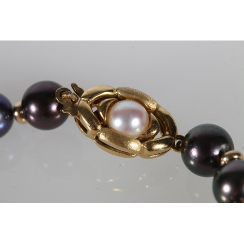 220 - Single strand of Tahitian black and white pearl necklace with 9ct yellow gold clasp.