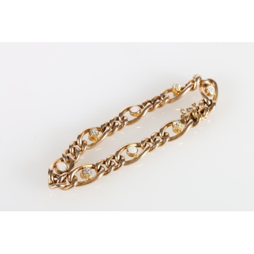 70 - 15ct gold curb link bracelet set with four 0.1ct round diamonds and four opals, stamped '15' to the ... 