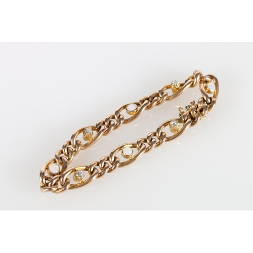 70 - 15ct gold curb link bracelet set with four 0.1ct round diamonds and four opals, stamped '15' to the ... 