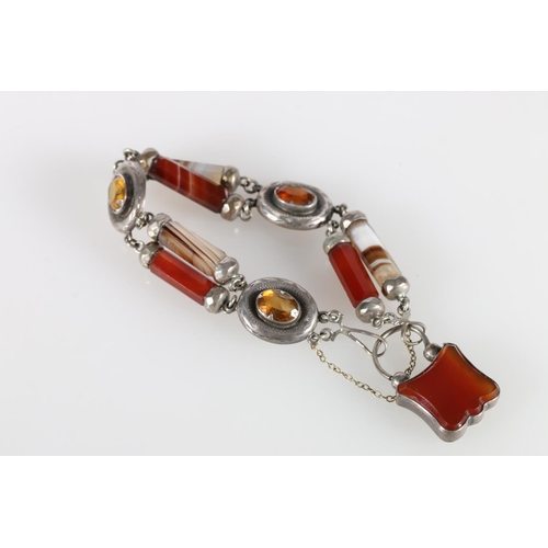 76 - Scottish pebble set bracelet with octagonal prism shaped links of banded agates and three links with... 