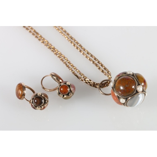 78 - Yellow metal Scottish pebble set spherical pendant set with banded agates and pearls, 15.7g on a 9ct... 