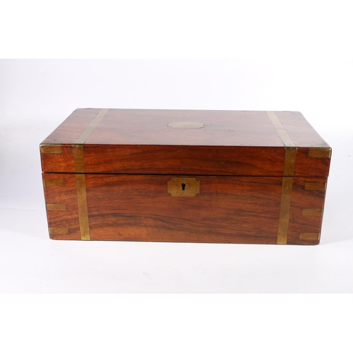 351 - Victorian walnut writing slope, with campaign style brass mounts, the interior fully fitted with lea... 