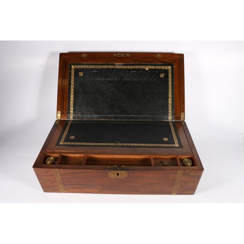 351 - Victorian walnut writing slope, with campaign style brass mounts, the interior fully fitted with lea... 