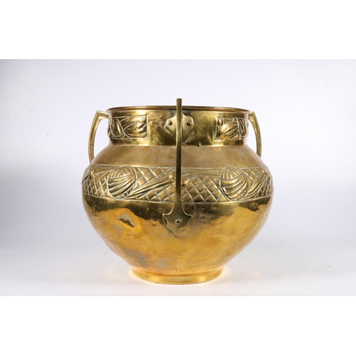 369 - Late 19th early 20th c. brass jardinière of bulbous form with three handles and yarn ball decoration... 