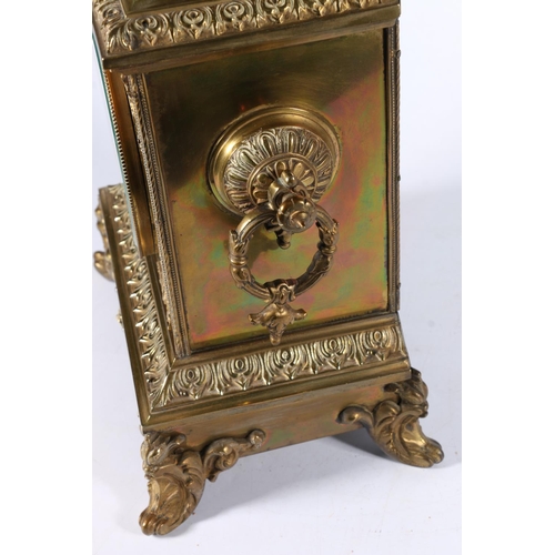 379 - French gilt brass striking mantle clock of architectural form with urn finial, the white enamel dial... 