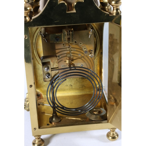 382 - French gilt brass pendant lantern style mantle clock, the dial with individual enamelled Arabic nume... 