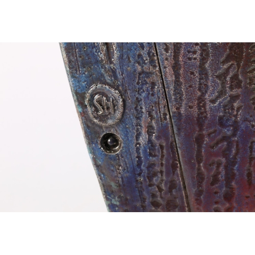 457 - SHAUN HALL, Sentinel, a studio art pottery raku fired vase with metallic blue/copper glaze, cut hole... 