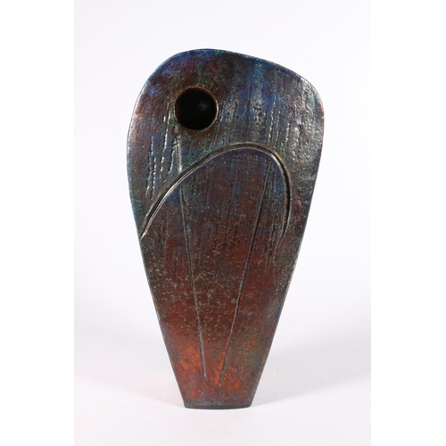 457 - SHAUN HALL, Sentinel, a studio art pottery raku fired vase with metallic blue/copper glaze, cut hole... 