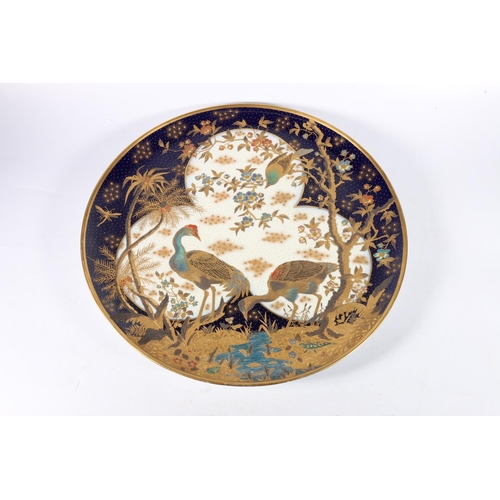 464 - Large Austrian porcelain charger decorated with Japanese style scene with cranes or egrets, dragonfl... 