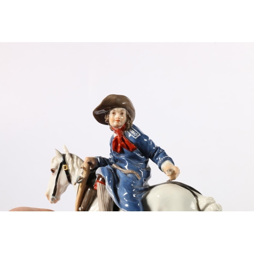 467 - Meissen figure of a man side saddle on a horse, 16cm.