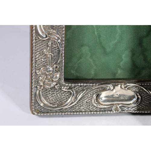 67P - Group of four hallmarked silver picture frames, and one white metal with elaborate rococo frame, 22c... 