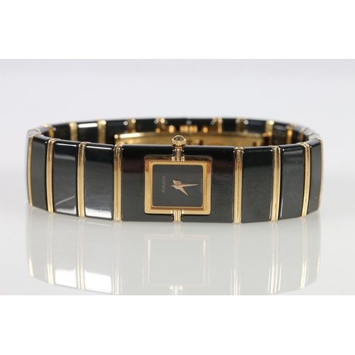 219 - Ladies 18ct gold plated steel Rado wristwatch.