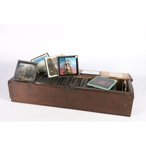 407 - Houghton-butcher projector, 22cm, with traveling case and collection of glass slides.