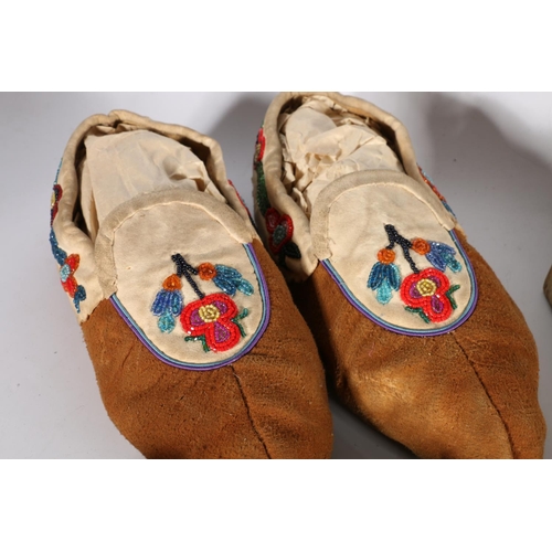 420 - Five pairs of Native American moccasins, money pouch and papoose, along with photograph of John Gard... 