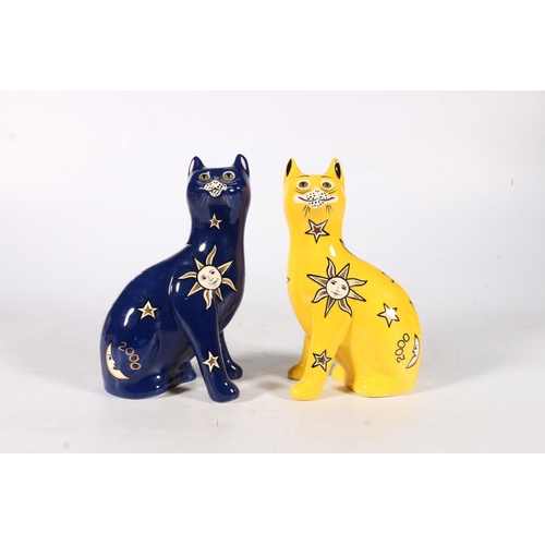 478 - Griselda Hill Wemyss Pottery, two Galle style cats decorated in the Millennium sun moon and stars de... 