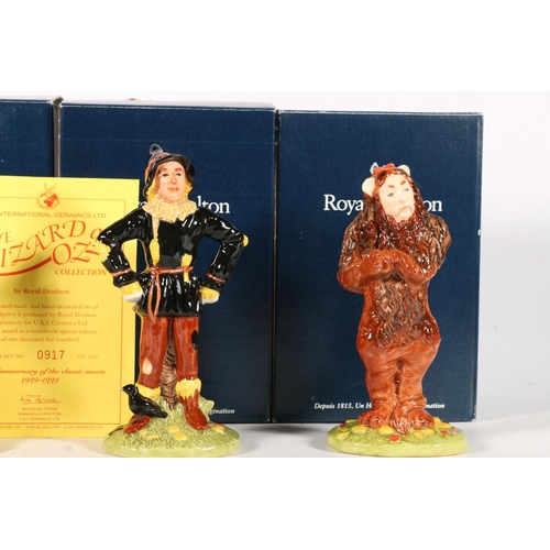 506 - Four Royal Doulton Wizard of Oz figures to include Dorothy, Scarecrow, Tinman, and Lion, with origin... 