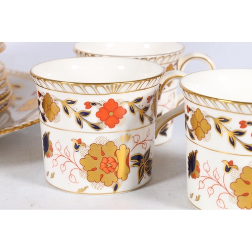 512 - Royal Crown Derby bone china twenty-one piece tea set decorated in the Imari palete, pattern number ... 