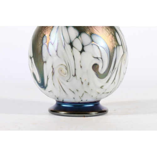 426 - Richard P Golding for Orka, an art glass baluster vase with white dab and swirl decoration on a lust... 