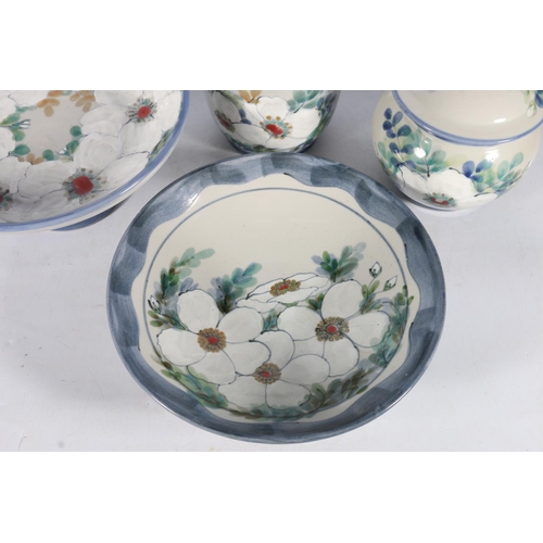 470 - Highland Stoneware of Ullapool, four pottery pieces with white floral design to include a pedestal b... 