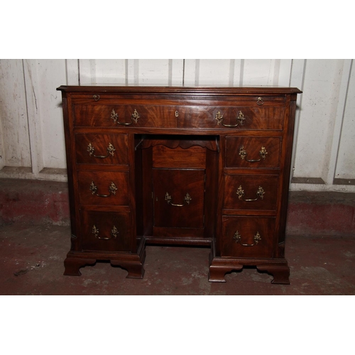 664 - 19th century mahogany dressing table, the top with canted corners over brushing slide, long frieze d... 