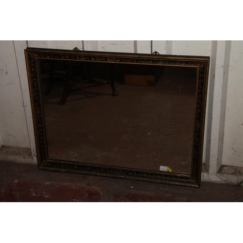 681 - 19th century wall mirror, the rectangular glass within a cavetto gilt and painted frame, 67 x 87cm.