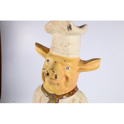 366 - Painted flat back cast iron figure of pig in chefs clothing, 60cm. 