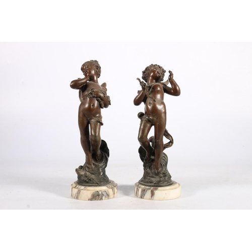 373 - Two French spelter figures, one of cupid the other a fairy, both indistinctly signed to base and wit... 