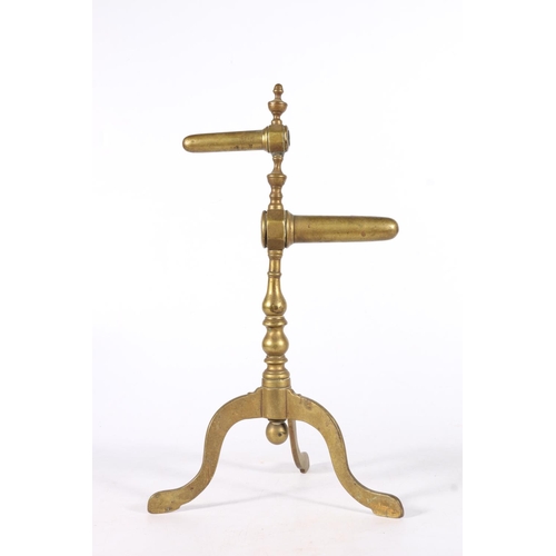 374 - 19th century brass double goffering iron stand, raised on three serpentine legs, 38cm tall.